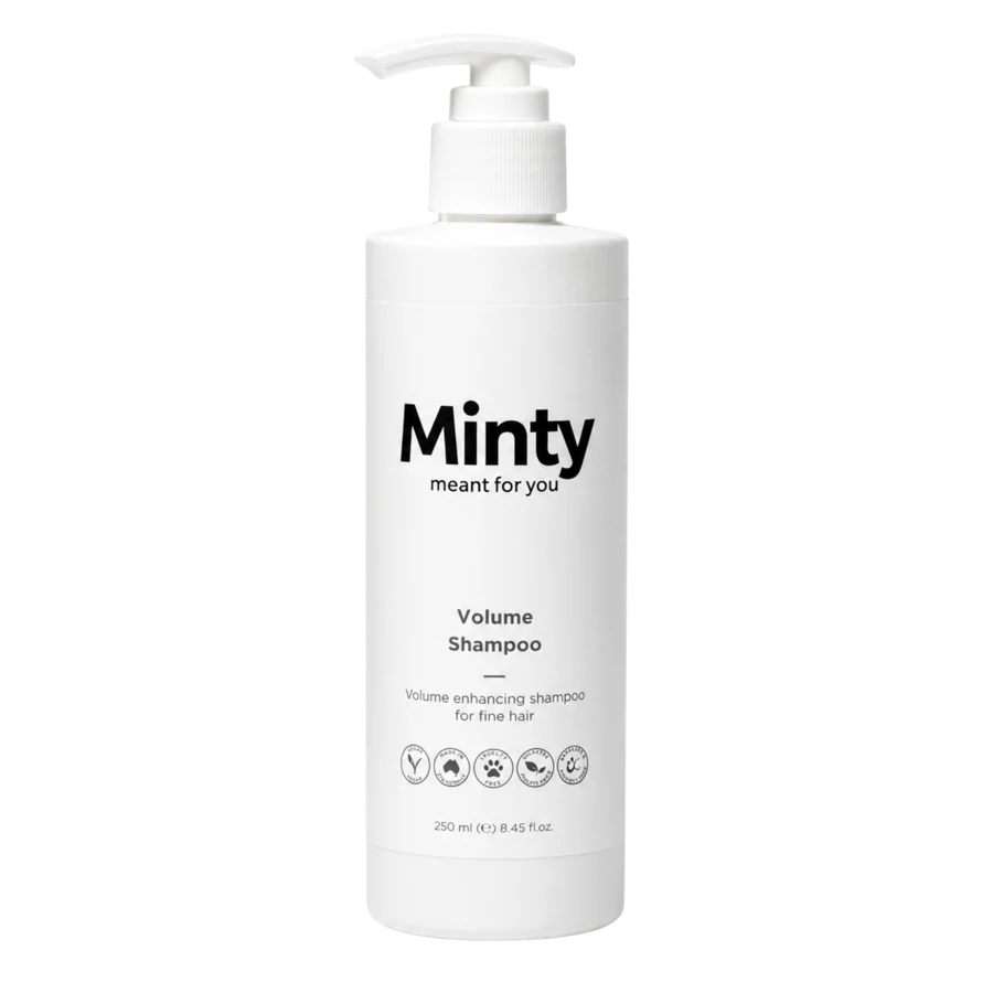 White bottle of Minty Volume Shampoo